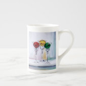 Weihnachtsverzierungen in der porzellantasse (Rechts)