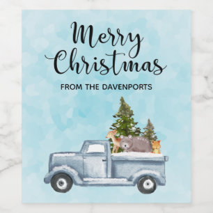 Weihnachtswagen mit Pinienbäumen und Waldtieren Weinetikett