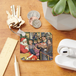 Weihnachtswunsch, Junge auf Weihnachtsmann Schlüsselanhänger