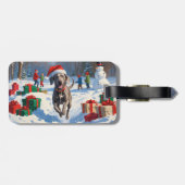 Weimaraner läuft im Schnee mit Weihnachtshut Gepäckanhänger (Rückseite horizontal)