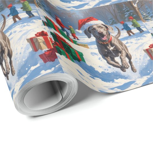 Weimaraner läuft im Schnee mit Weihnachtshut Geschenkpapier (Rolleneckpunkt)