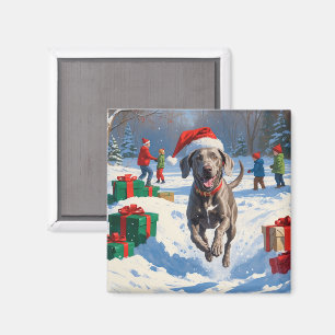 Weimaraner läuft im Schnee mit Weihnachtshut Magnet