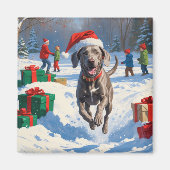Weimaraner läuft im Schnee mit Weihnachtshut Magnet (Vorne)
