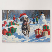 Weimaraner läuft im Schnee mit Weihnachtshut Puzzle (Horizontal)