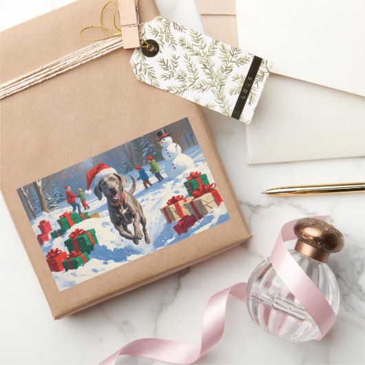 Weimaraner läuft im Schnee mit Weihnachtshut Rechteckiger Aufkleber (Schenken)