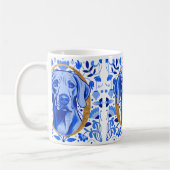 Weimaraner peering thru the letter "O" in Gold Kaffeetasse (Links)