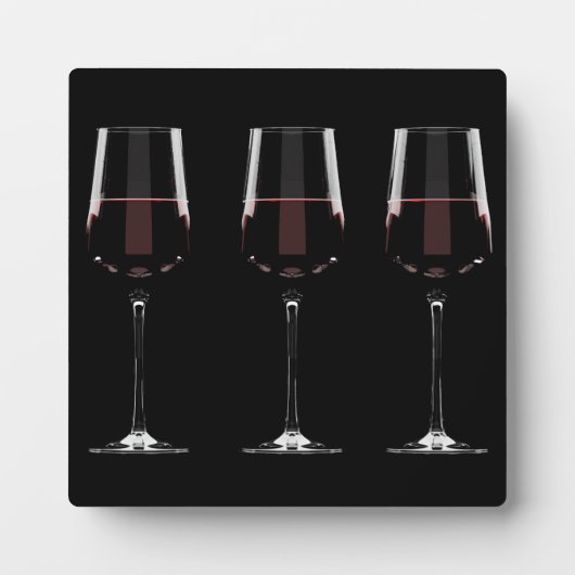 Weingläser mit Rotwein auf schwarz Fotoplatte (Vorderseite)