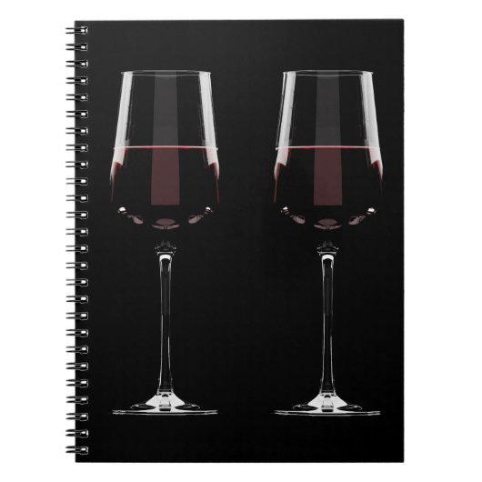 Weingläser mit Rotwein auf schwarz Notizblock (Vorderseite)