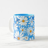 Weiß bläst auf blauem Hintergrund. Handgezeichnete Zweifarbige Tasse (Vorderseite Links)