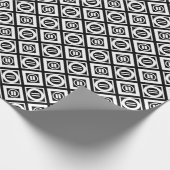 Weiß Gleiche Zeichengeometrie auf schwarz Geschenkpapier (Ecke)