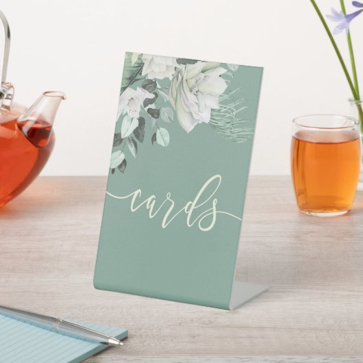 Weiß-grüne Blumenkarten-Zeichen Sockelschild (In SItu)