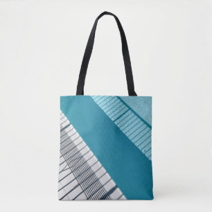 Weiß und blau gestreifte Textilien Tasche