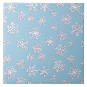 Weiße 3-D-Schneeflocken auf eisblauem Hintergrund Fliese
