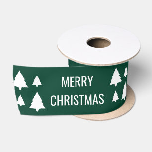Weiße Bäume mit Frohe Weihnachten Text auf Grün Satinband