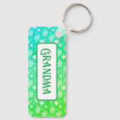 Weiße Blätter auf grünem Schlüsselanhänger (Rückseite)