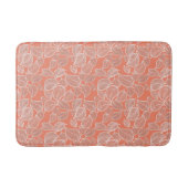 Weiße Blätter auf Orangenmatte Badematte (Vorderseite)