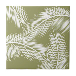 Weiße Blätter aus der Palme auf grünem Hintergrund Fliese