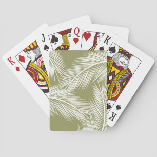 Weiße Blätter aus der Palme auf grünem Hintergrund Spielkarten
