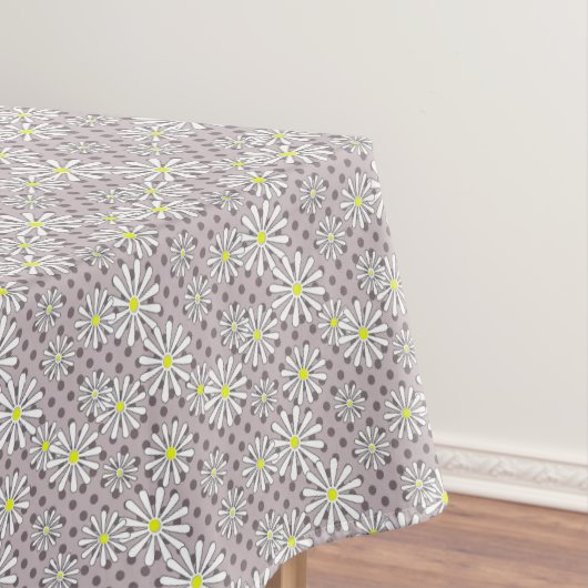 Weiße Blume auf einem beigen, braunen Polka-Punkt Tischdecke (Beispiel)