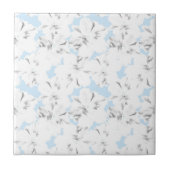 Weiße Blume auf hellblau. Fliese (Vorderseite)