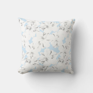 Weiße Blume auf hellblau. Kissen