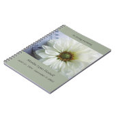 Weiße Blume auf Musikdenkmal Notizblock (Linke Seite)