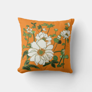 Weiße Blume auf Orange Kissen