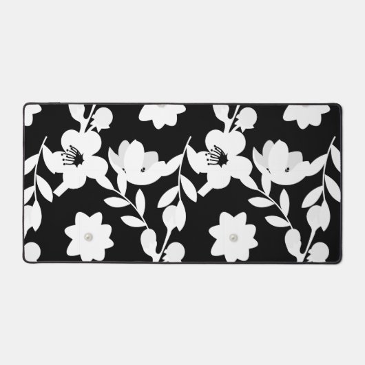 Weiße Blume mit Perlen auf schwarz Schreibtischunterlage (Vorderseite)