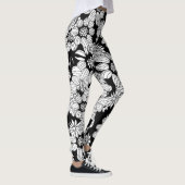 Weiße Blumen auf einem schwarzen Hintergrund Leggings (Rechts)