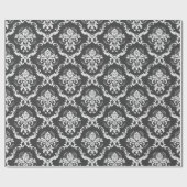 Weiße Blumendamentrockenmuster auf dunkelgrau Geschenkpapier (Flach)