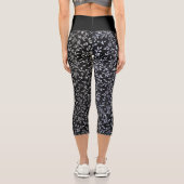 Weiße Blumenmotive in Schwarz Capri Leggings (Rückseite)