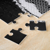 Weiße Blumenspitze: schwarzer Hintergrund. Puzzle (Seite)