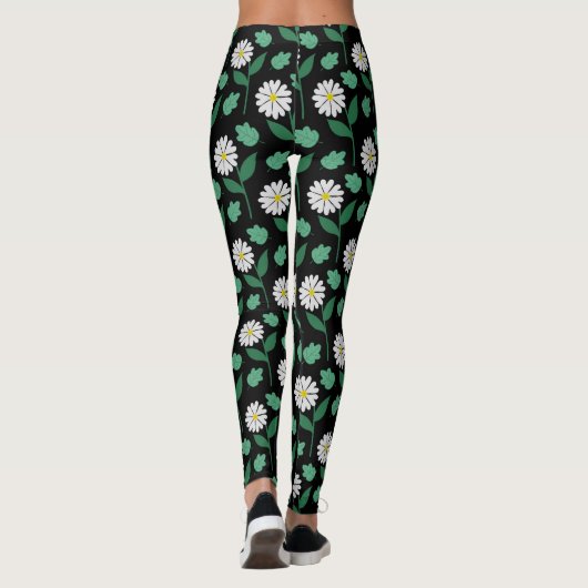 Weiße Blüte auf schwarzem Hintergrund Leggings (Rückseite)