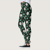Weiße Blüte auf schwarzem Hintergrund Leggings (Links)