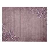 Weiße Einrichtung auf zerkleinertem burgundy Lined Notizblock (Vorderseite)