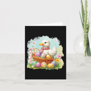 Weiße Ente auf einem Bysket voller Ostereier; Oste Karte