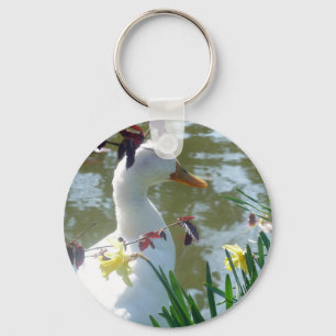 Weiße Ente in Hülsenfrüchten am Keyring Schlüsselanhänger