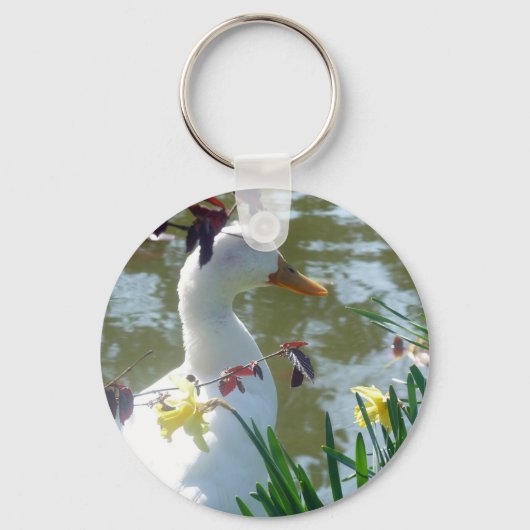 Weiße Ente in Hülsenfrüchten am Keyring Schlüsselanhänger (Vorderseite)