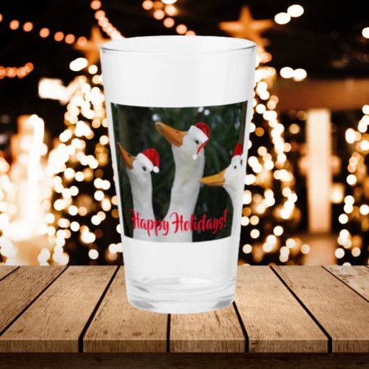 Weiße Enten mit roten Weihnachtsmannmützen Urlaub Glas