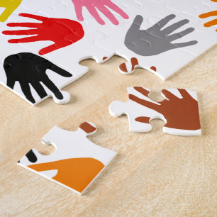 Weiße farbenfrohe Handabdruck-Musterdesign Puzzle