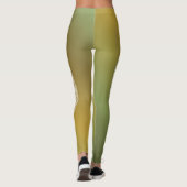 Weiße Feder auf der Erde strahlt strahlend Leggings (Rückseite)