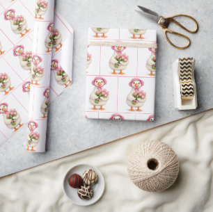 Weiße Gans hält rosa Tulpenstrauß Geschenkpapier