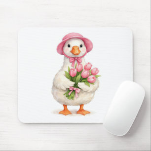 Weiße Gans hält rosa Tulpenstrauß Mousepad