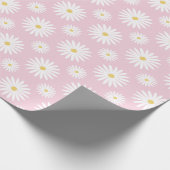 Weiße Gänseblümchen auf Rosa Geschenkpapier (Ecke)