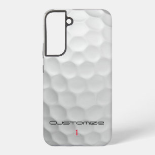 Weiße golfkugel mit strukturierter oberfläche und  samsung galaxy hülle