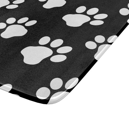 Weiße Hunde-Katzenpaw-Drucke auf Schwarz Schneidebrett (Ecke)