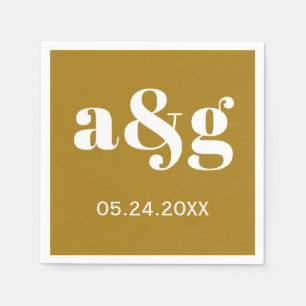Weiße Initialen Typografie auf der goldbraunen Hoc Serviette