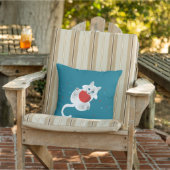 weiße Katze, die mit roter Kugel und Blatt spielt Kissen (Stuhl)