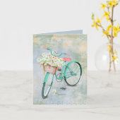 Weiße Katze in einem dunklen Korb, die an dich den Karte (Gelbe Blume)