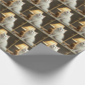 Weiße Katze in wärmer Lampe sitzend Geschenkpapier (Ecke)